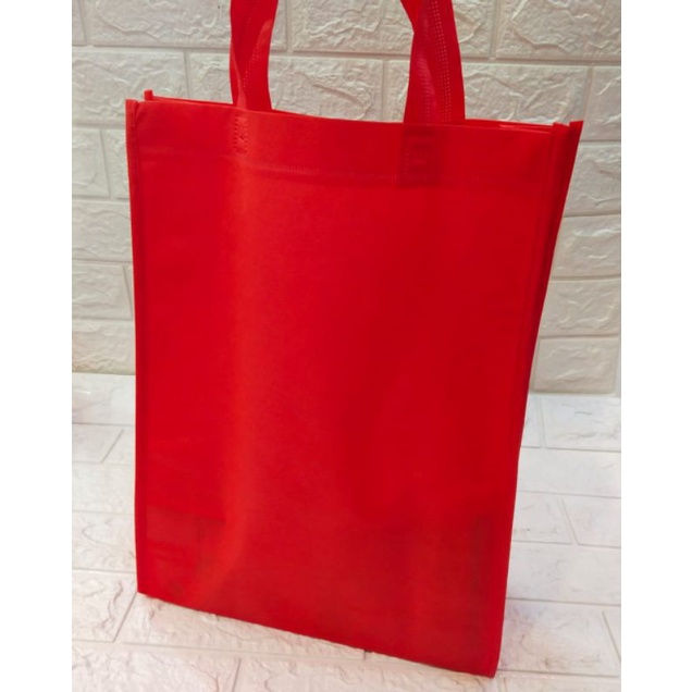 

TAS SPOUNDBOND/ GOODIE BAG BOX JAHIT UK.30x40x10cm. 1PAK ISI 12PCS