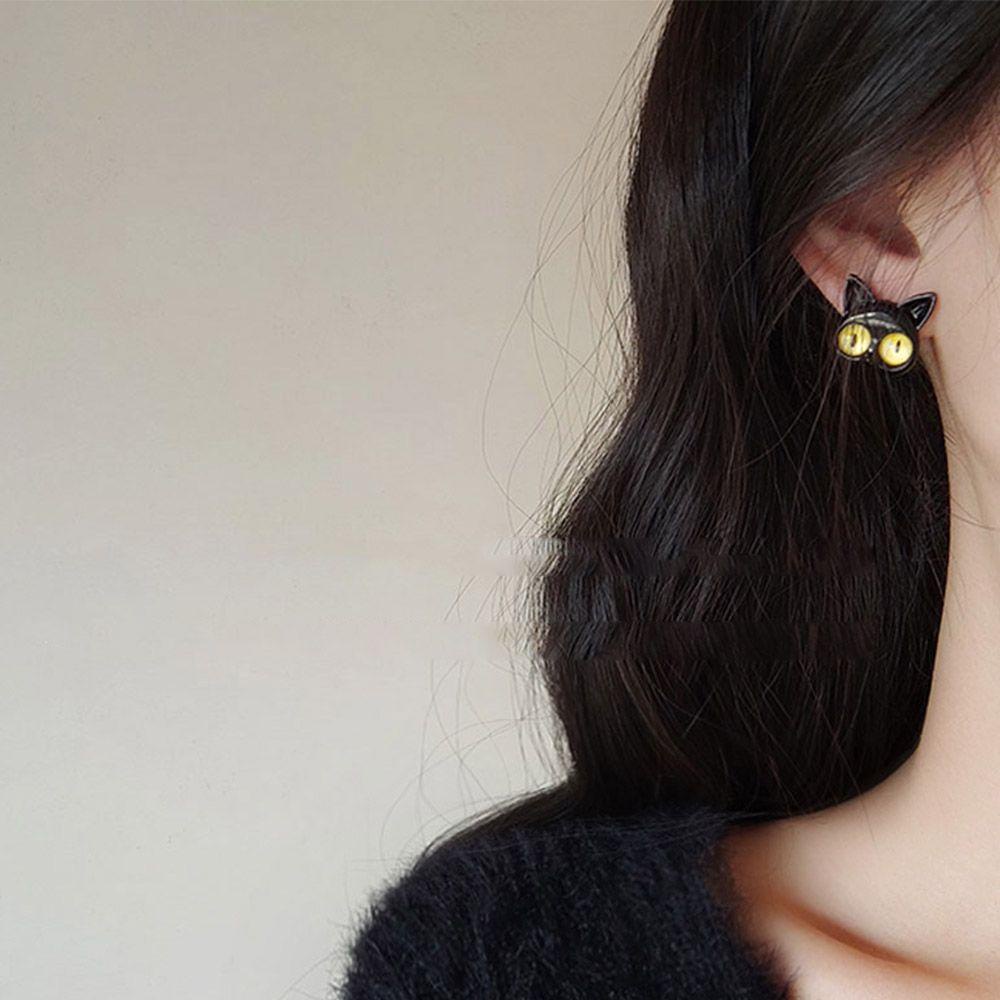 Needway Anting Wanita Temperamen Lucu Gadis Hadiah Aksesoris Pesta Kucing Hitam Alloy Asimetris Telinga Stud