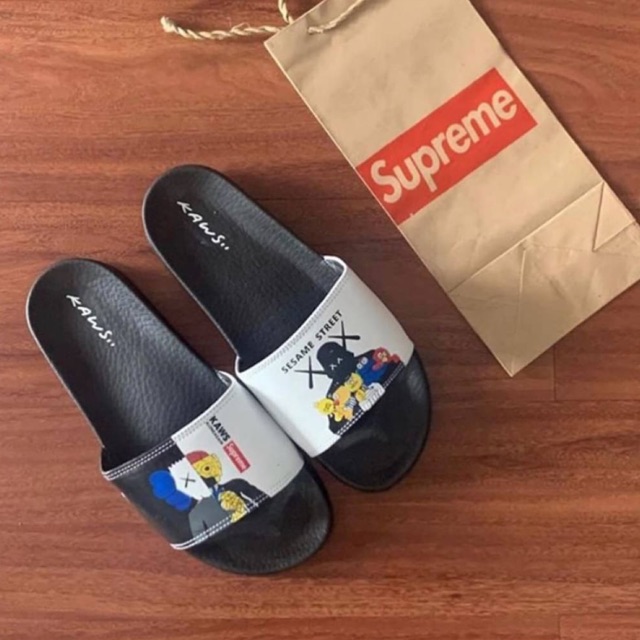 TERMURAH!!  “SANDALS SLIDES HYPEBEAST” Kaws x Supreme