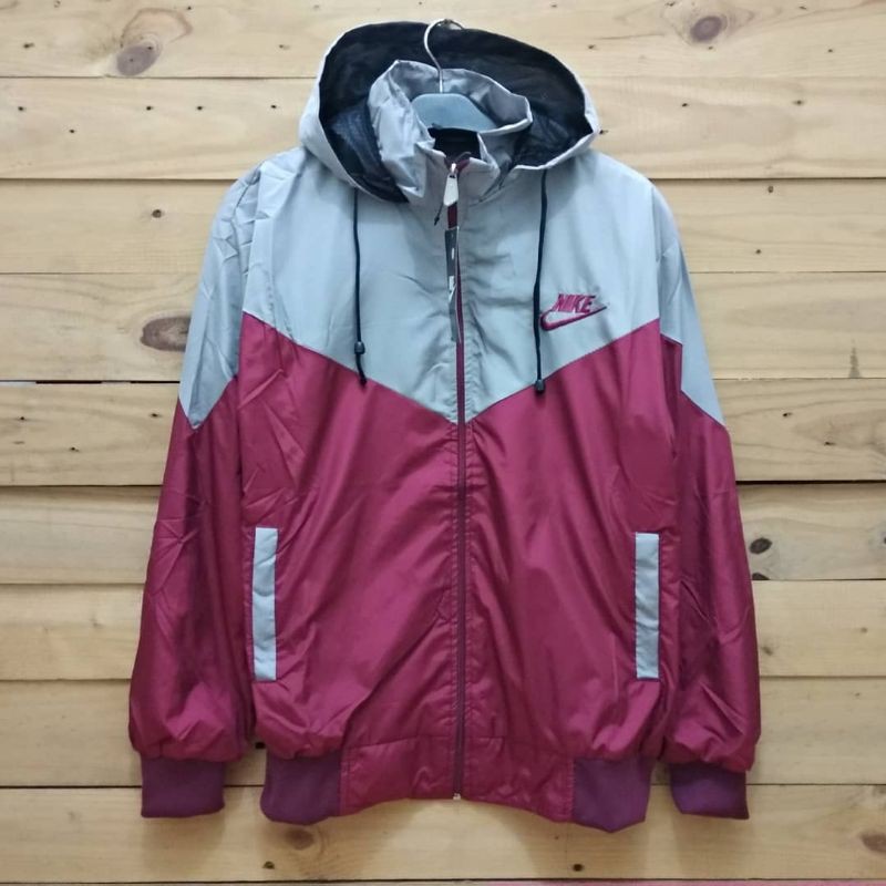 Jaket parasut nike abu merah