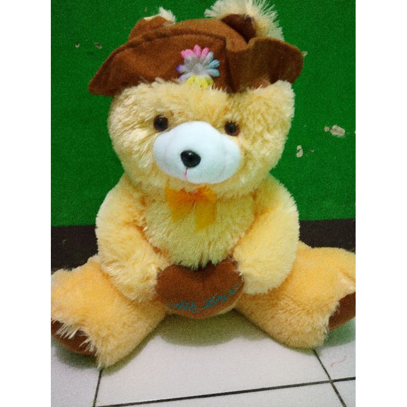 Boneka teddy bear topi XL duduk