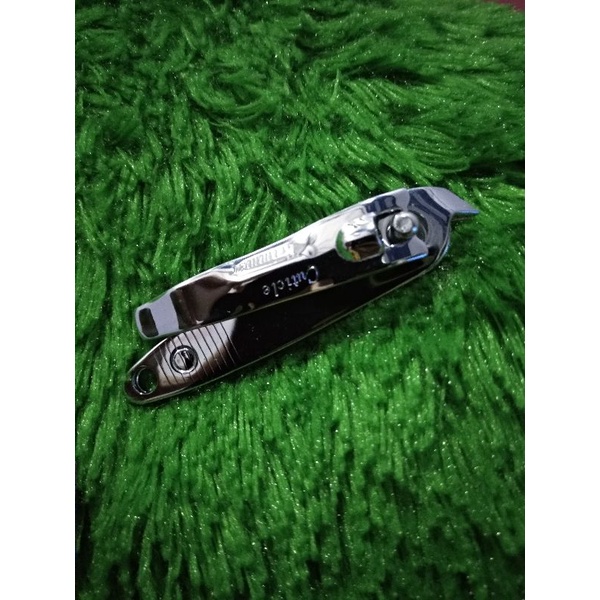 gunting kuku miring sudut