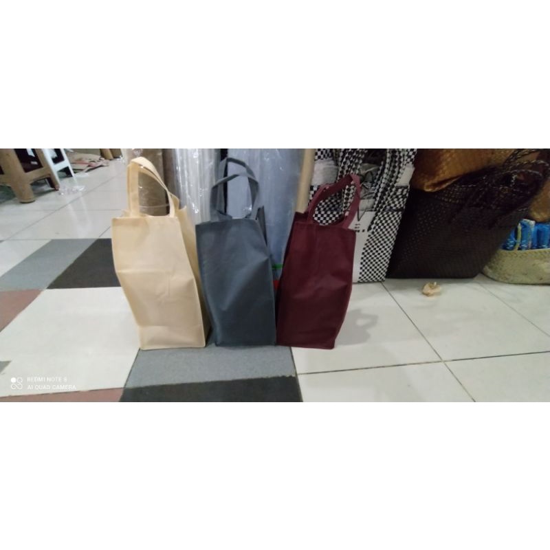 

tas kain spunbond buat toples atau botol dan toples isi 12 pcs terlaris dan termurah