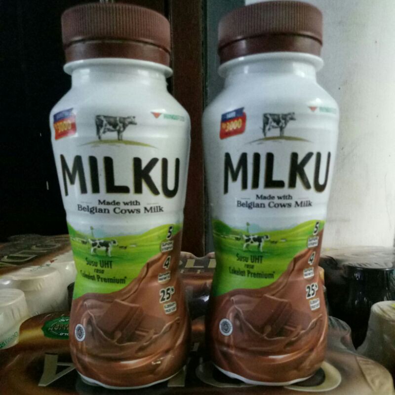 

MILKU susu UHT 200ml isi 12botol