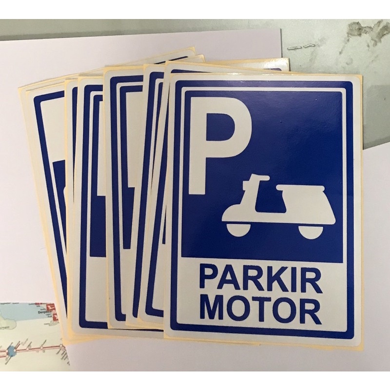 

Rambu sign sticker parkir motor jalan raya menyala lampu mobil