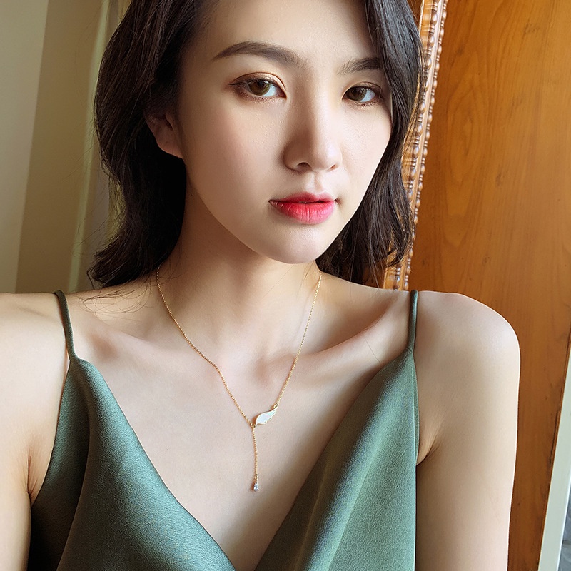 Kalung sayap juntai titanium anti karat korea style terbaru - ercassia