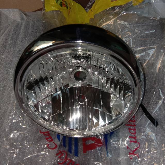 Reflektor lampu depan Megapro Primus 2006