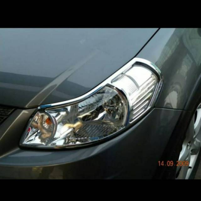 Garnish lampu depan SX4/ head lamp garnish chrome