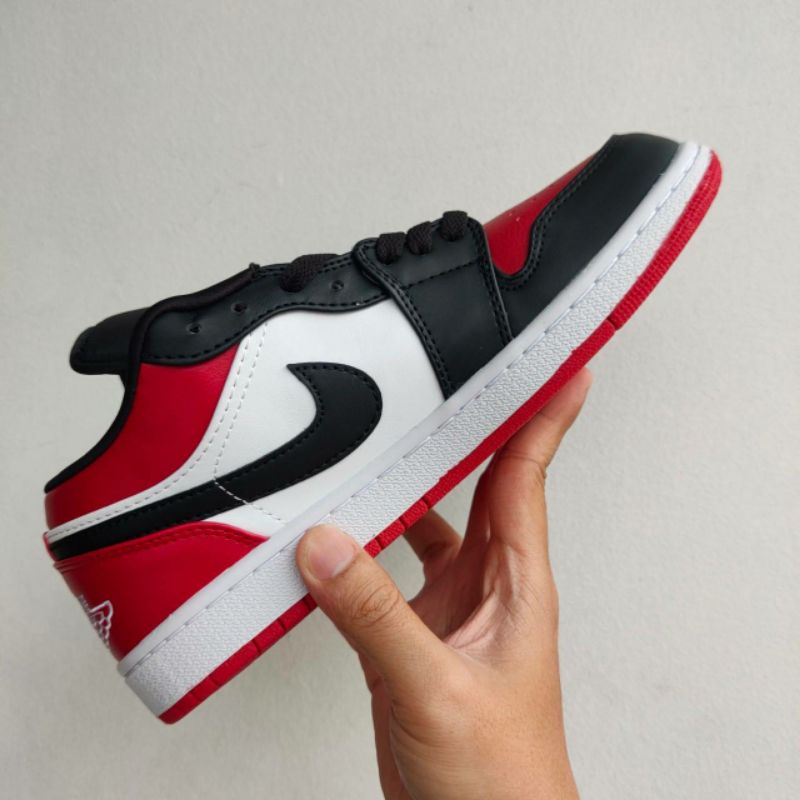 low jordan 1 black and red