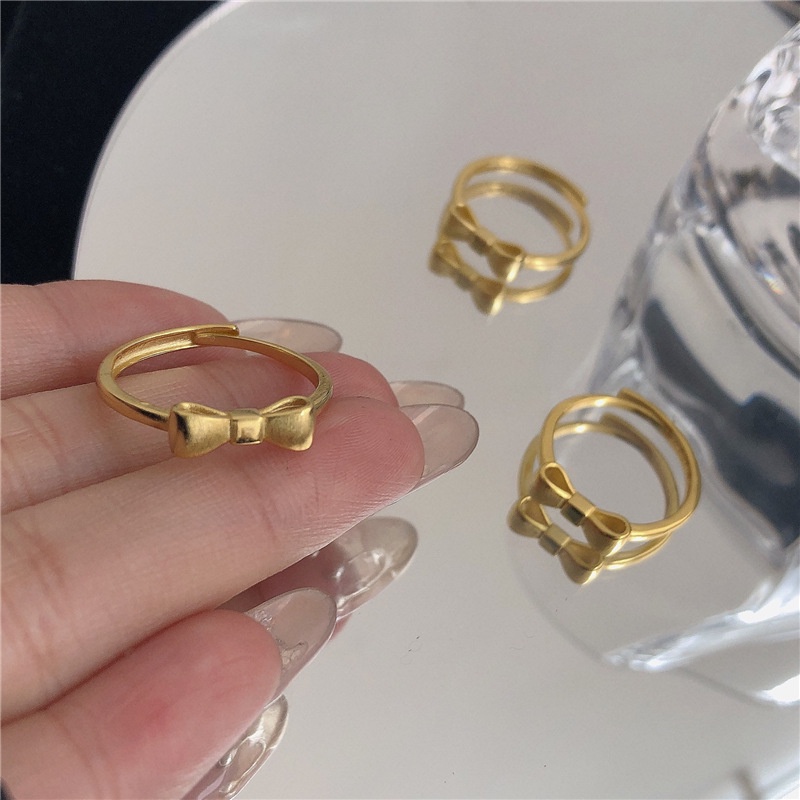 Cincin Model Terbuka Desain Pita Warna Gold Matte Gaya Uniksimple Untuk Wanita