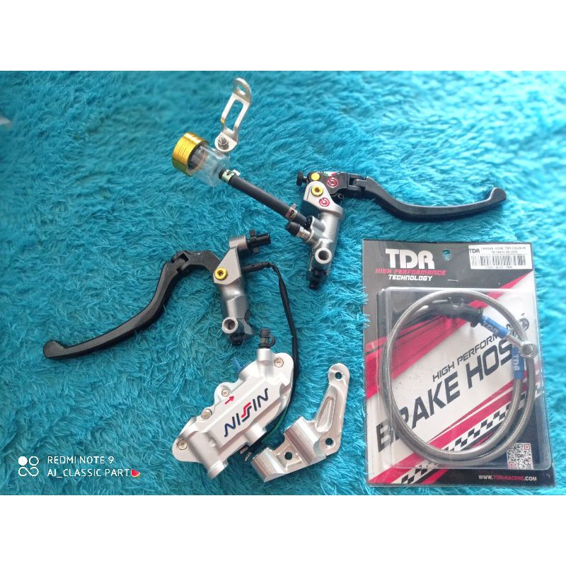 pengeriman depan brembo set caliper nissin buat ninja R & RR