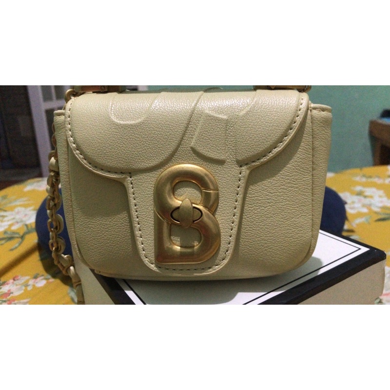 alma flap bag micro butter buttonscarves