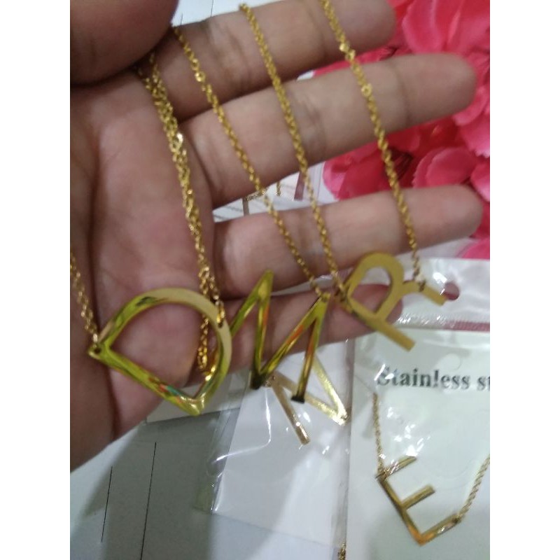 Kalung huruf titanium stainless steel