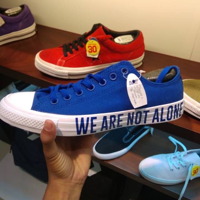 converse we are not alone