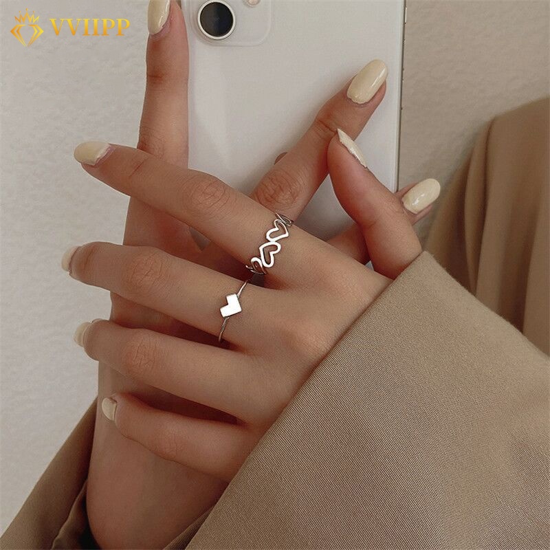 Set Cincin Desain Hati Hollow Bahan Alloy Warna Silver Gaya Korea Untuk Wanita