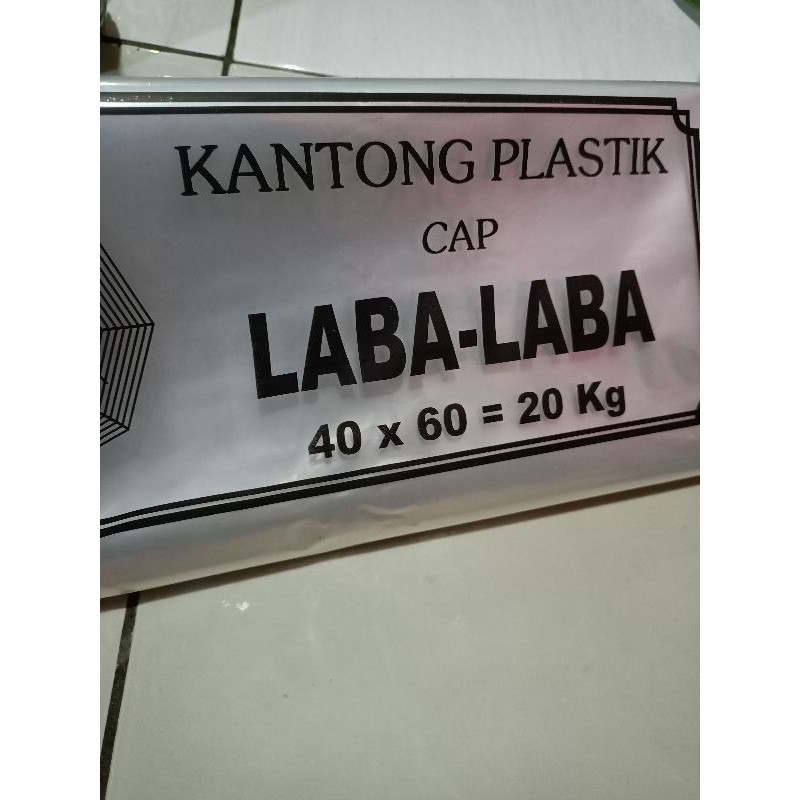 kantong plastik bening laundry cap laba- laba ukuran 40x60= 20 kg