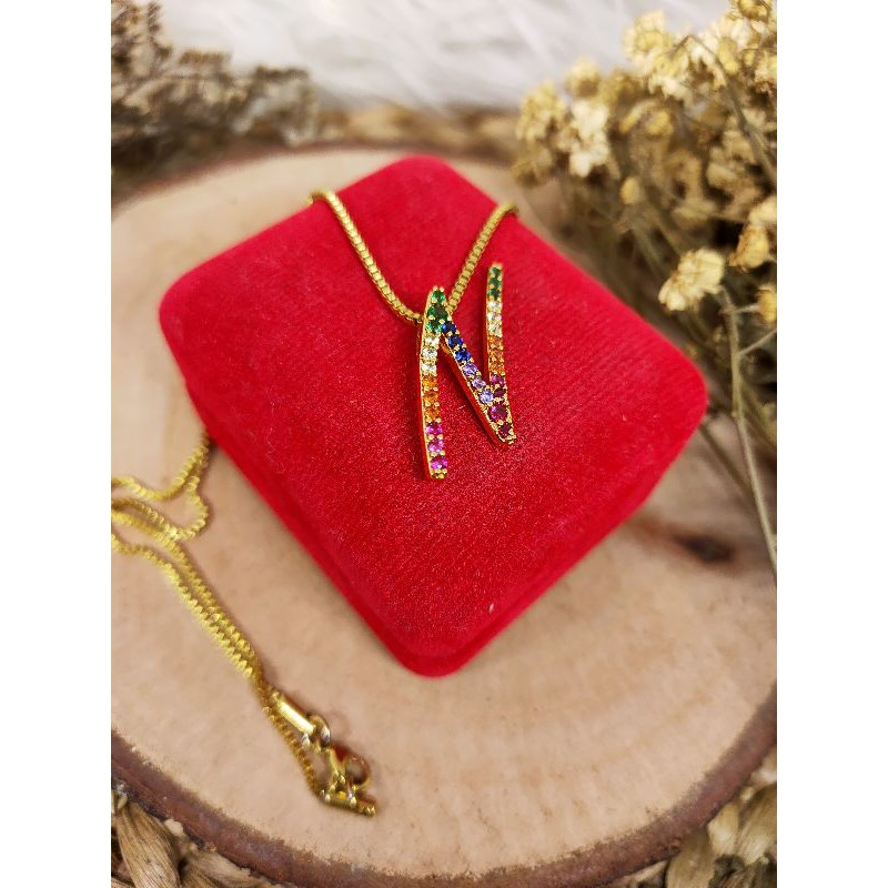 Kalung Huruf persis emas asli TITANIUM