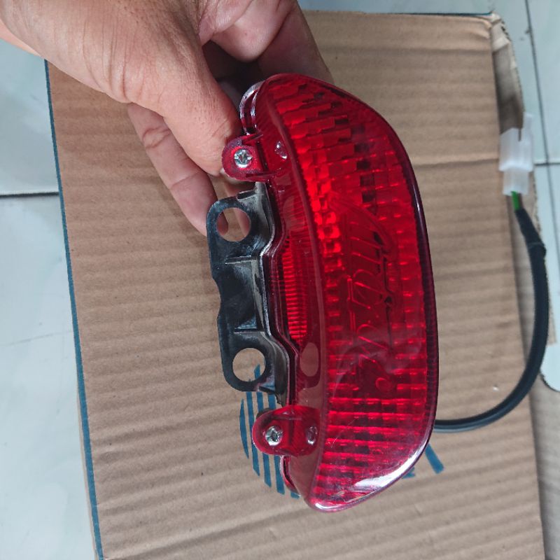 Stoplamp honda GRAND ASTREA BULUS bawah 1 set dan mika