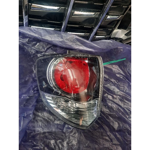 Stoplamp lampu belakan TOYOTA fortuner vnt trd 2014 2015 kiri original smoke atau black crome
