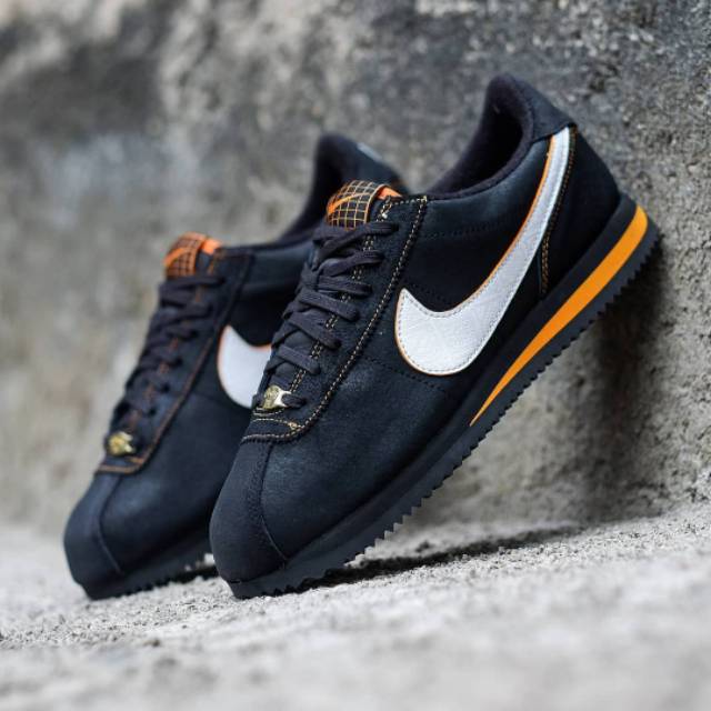 nike cortez black orange