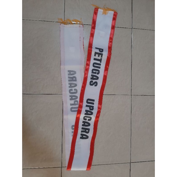 Selempang petugas upacara sablon