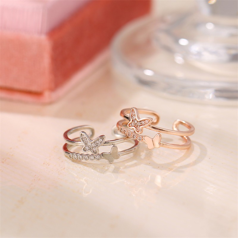 Cincin Model Terbuka Adjustable Desain Butterfly Bahan Zircon Warna Silver Untuk Pesta