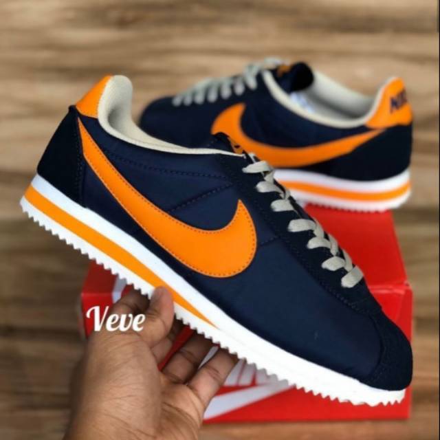 orange and blue nike cortez