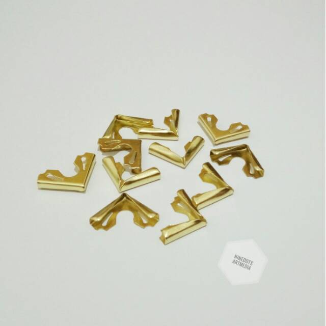 

SIKU EMAS, AKSESORIS/ PENGAMAN SUDUT BUKU TAMU HARD COVER