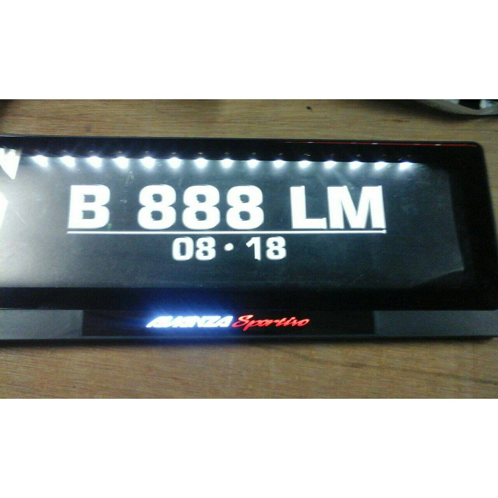 Tatakan / Tempat Plat Nomor Premium Mobil  AVANZA Sportivo Lampu