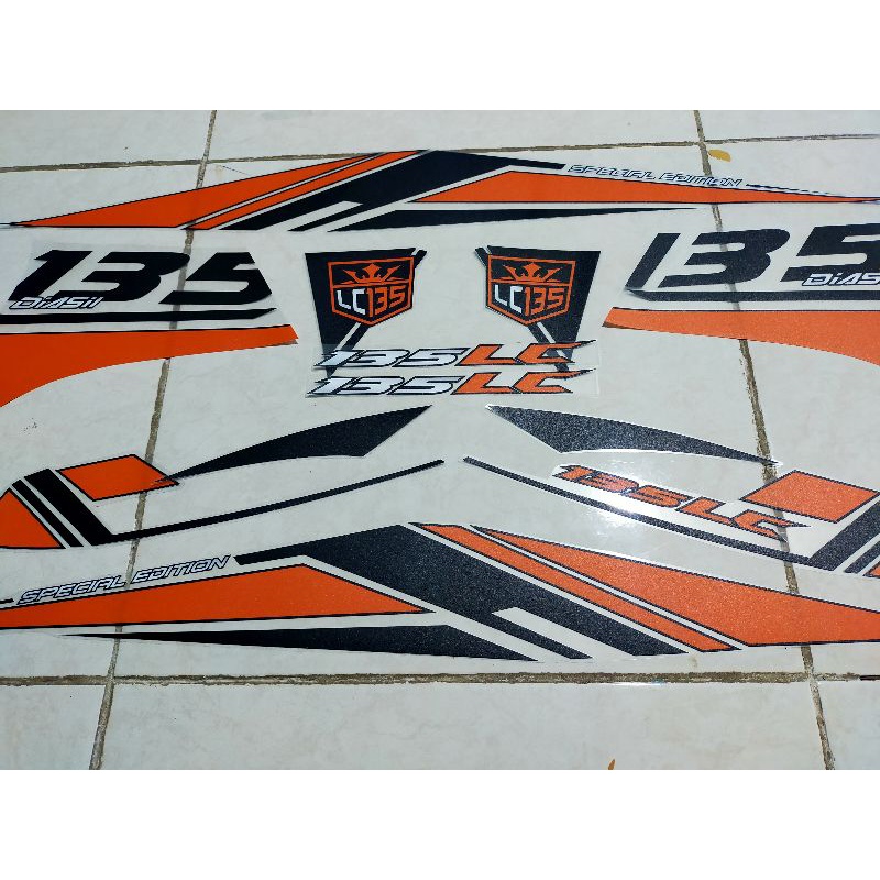 STRIPING STICKER TRANSPARAN MX NEW 135 LC LIST BLACK ORANGE