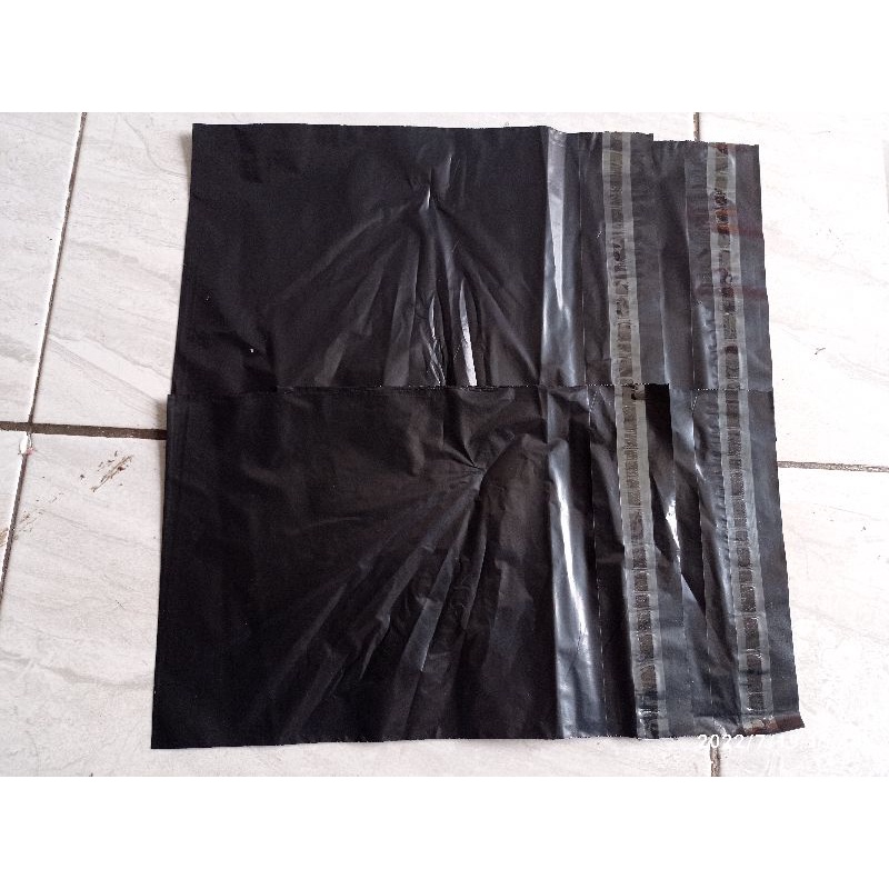 Plastik packing Praktis Bungkus Tebal Tanpa Plong Packing Online Shop Paking 25x35