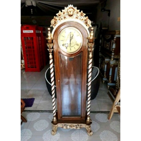 almari jam model untir jati asli jepara