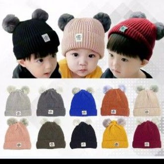 kupluk pompom dc /original kupluk polos dengan label di tengah ny