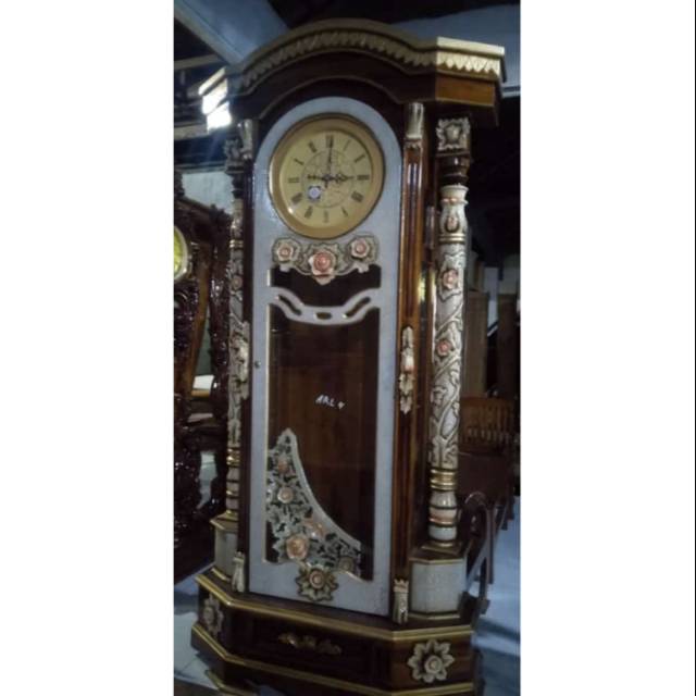 Lemari jam hias kayu jati asli jepara tinggi 210cm