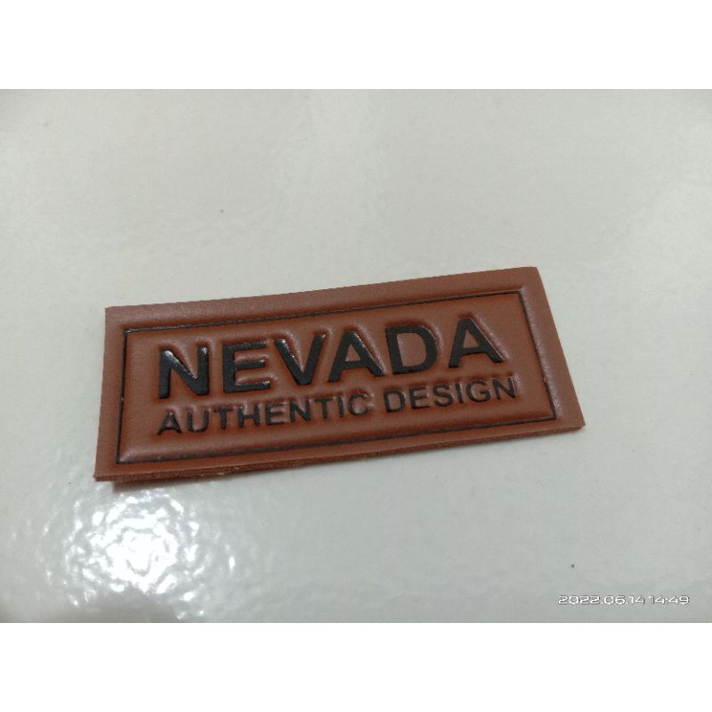 Label Merk Kulit Sintetis Embos