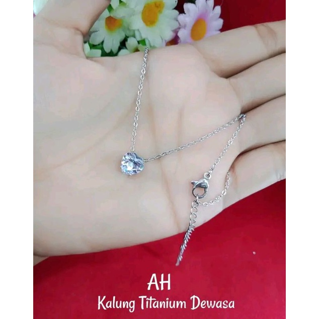 kalung love putih titanium