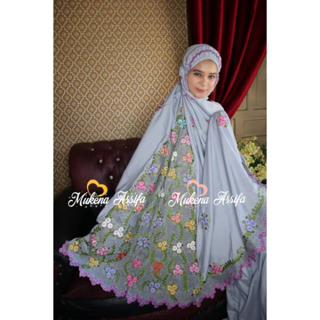 Mukena bordir matahari timbul