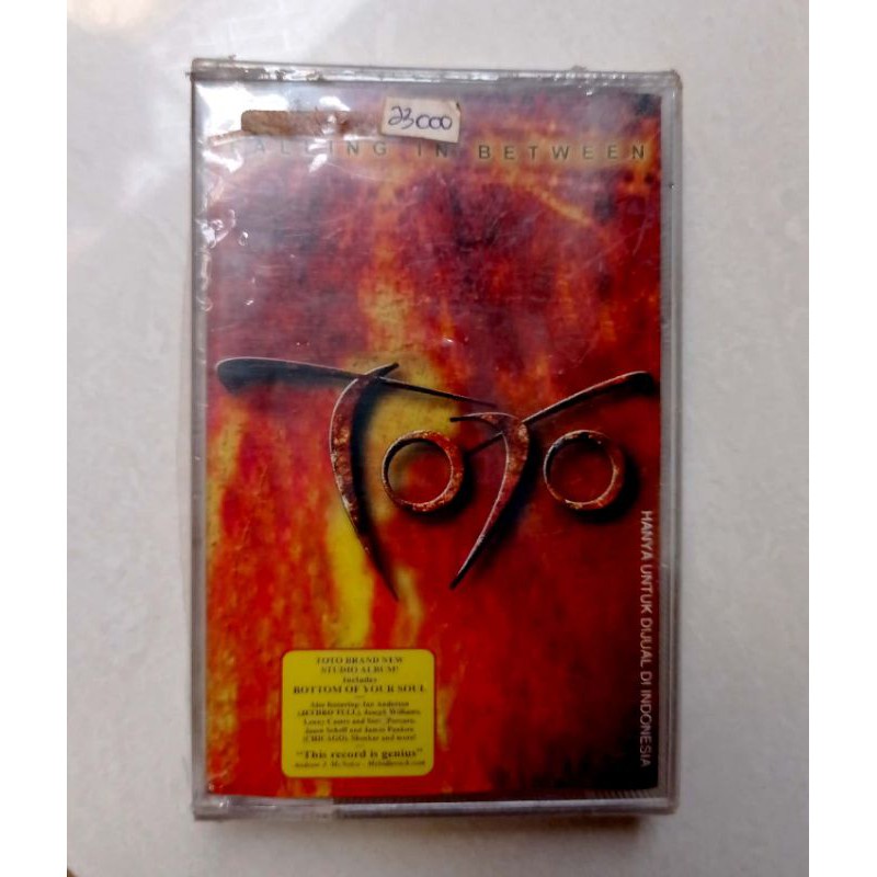 kaset ori TOTO FALLING IN BETWEEN kondisi segel new old stock