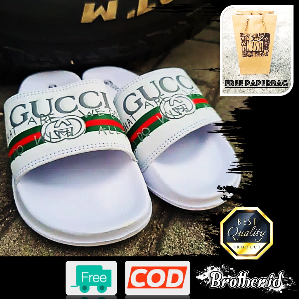 Sandal gucci timbul semi import karet sendal gucci Flipflop Sandal Pria Wanita - Putih