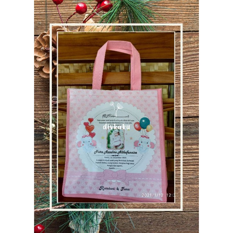 

tas ulang tahun spunbond dengan ukuran p23xl20xt25 free desain tas ualng tahun murah