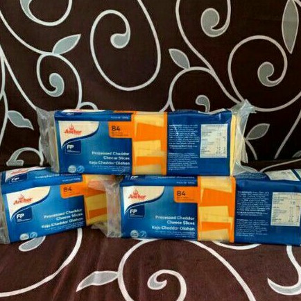 

KEJU CHEDDAR ANCHOR SLICE 1KG @84 SLICE/@28 SLICE