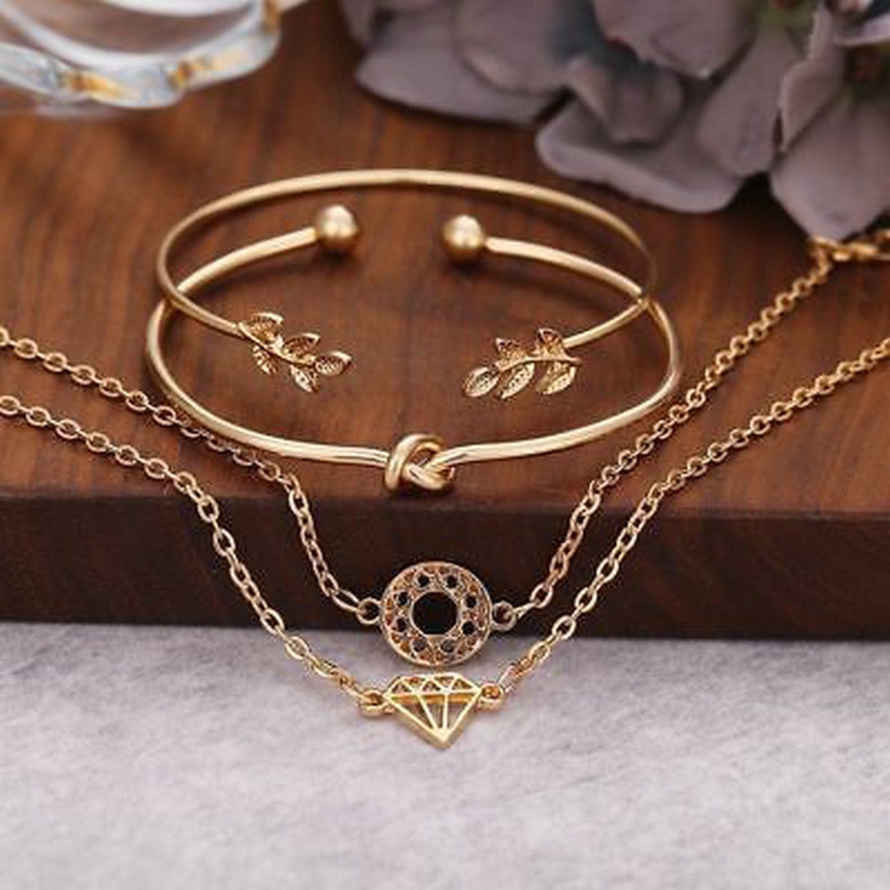 4pcs / Set Gelang Rantai Bentuk Daun Simpul Warna Rose Gold Untuk Wanita