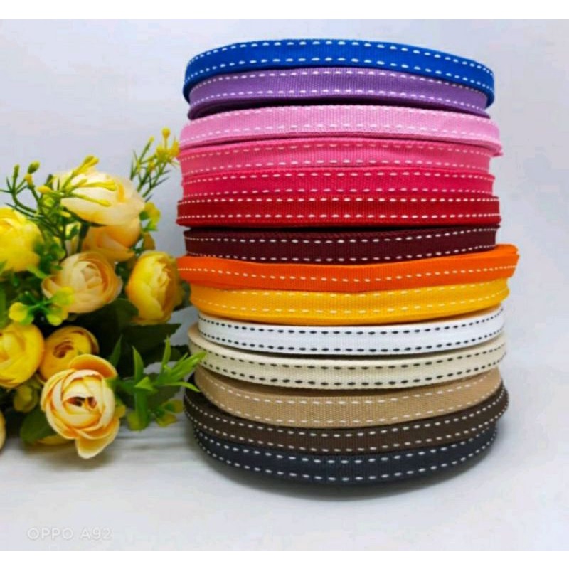 

Pita Tali Grosgrain motif bintik & Salur Ukuran 3/8=1cm