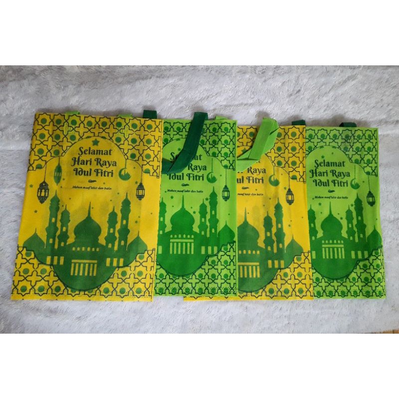 

PROMO ,TAS KAIN SPUNDBOND IDUL PITRI TAS BINGKISAN PARSEL UK 38×45 ISI 12 PCS