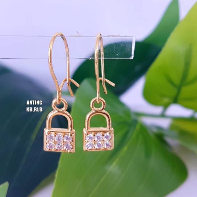 Anting titanium import kode 10 awet dan paket usaha