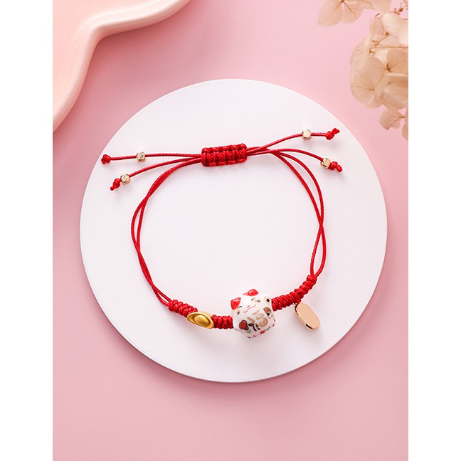 LRC Gelangh Fashion Woven Ingot Ceramic Cat Elastic Bracelet F89357