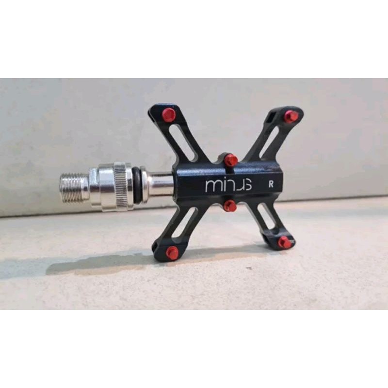 Pedal QR merk minus. Quick release sepeda lipat