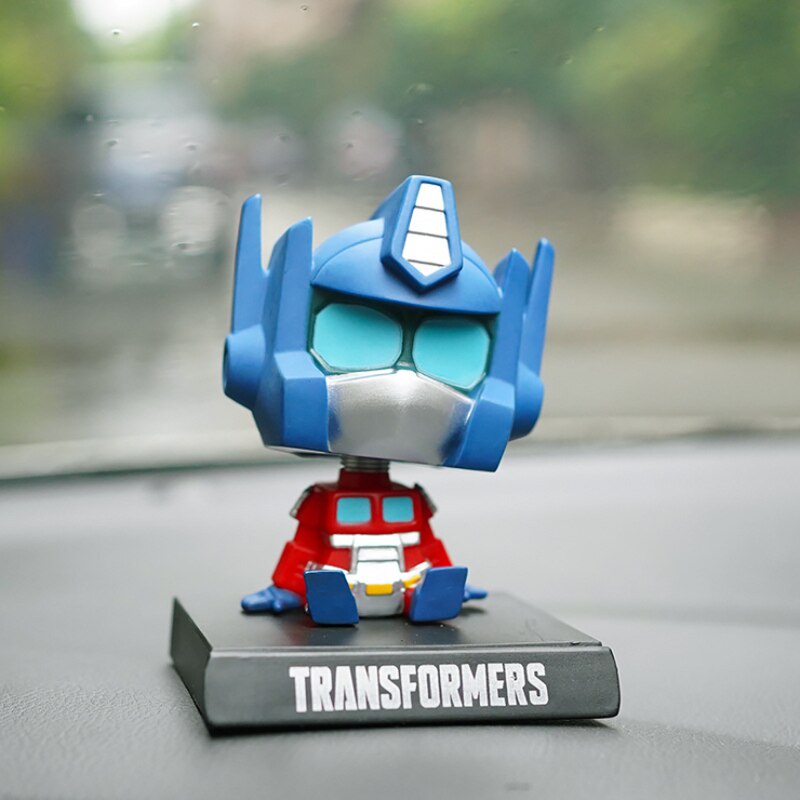 Pajangan Dashboard Mobil Transformers G1 / Bobble Head &amp; Phone Holder