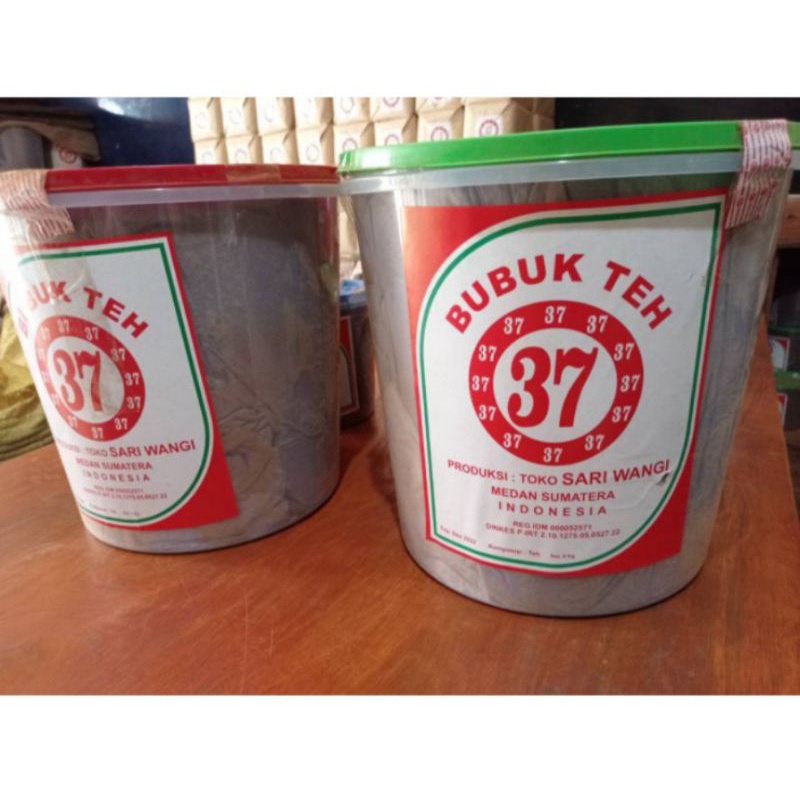 

Teh wangi cap 37 toples besar 10kg berat bersih teh 9kg sari wangi medan.