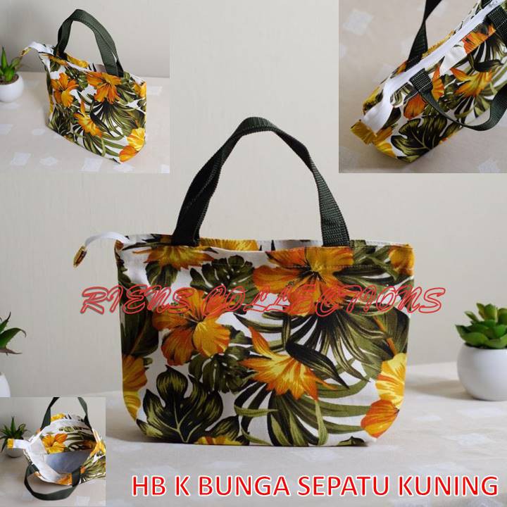 RIENS COLLECTIONS. HANDBAG KECIL BAHAN KANVAS MOTIF BUNGA SEPATU KUNING. TAS SOUVENIR JOGJA. OLEH OLEH JOGJA